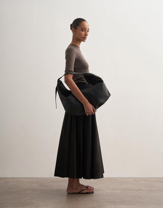 Voluminous Cotton Skirt with Hem Panel – Black