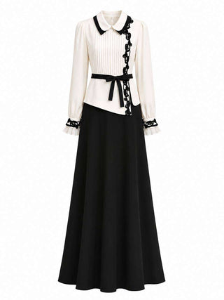 Ozoda Couture Noirelle ivory and black maxi dress with contrast detailing and waist bow